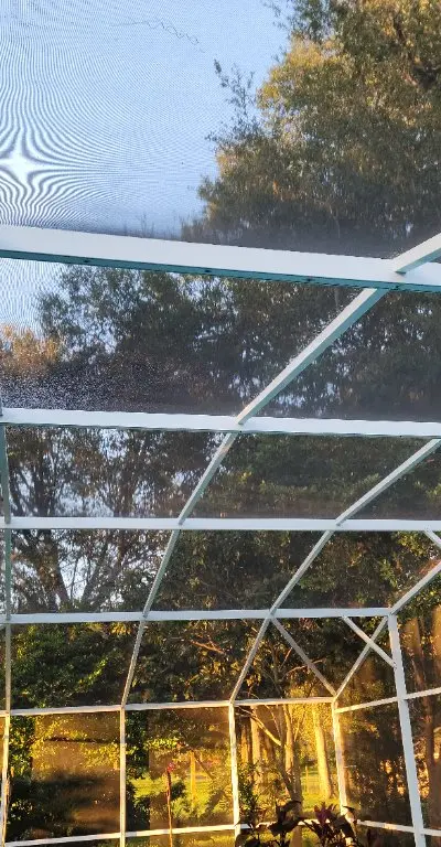 Screen enclosure frame washing