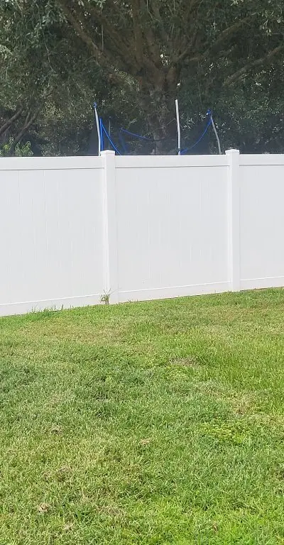 Clean white vinyl fence after washing