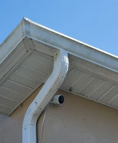 Clean white gutters after pressure washing